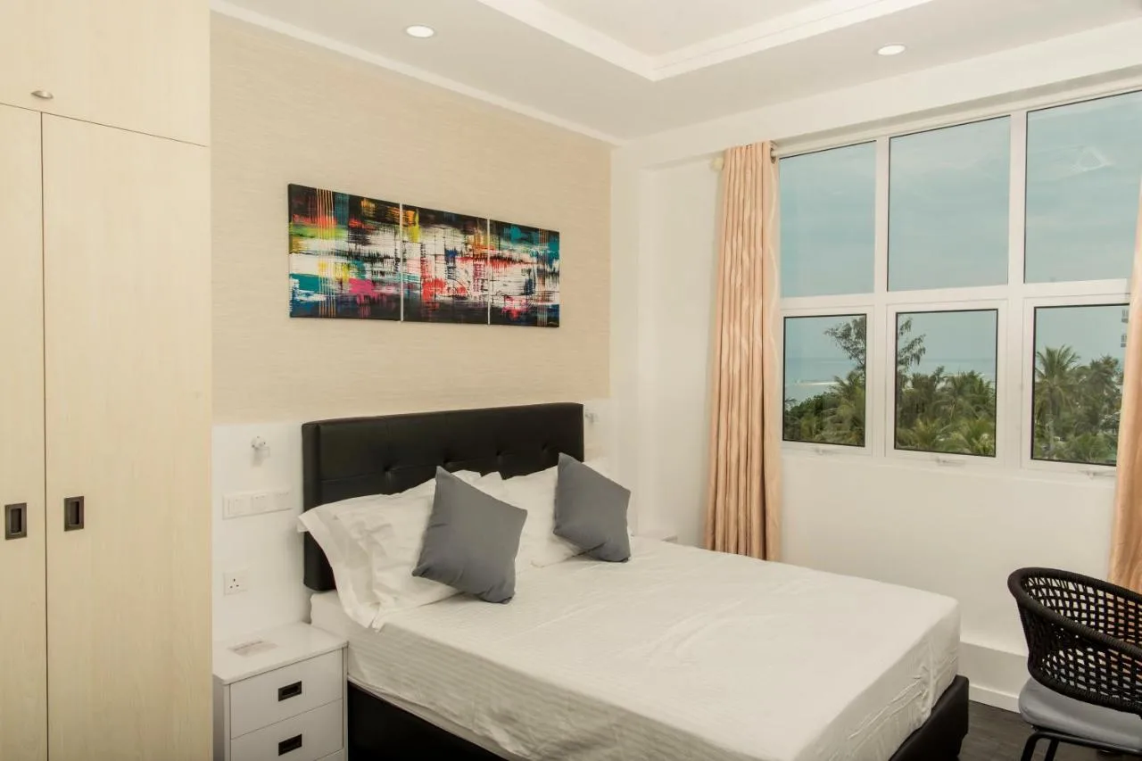 Embrace beachfront bliss at the Acacia Beach Hotel. This hotel offers stunning ocean views, and comfortable rooms, perfect for those seeking a relaxed island getaway.