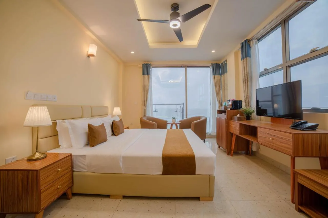 Air-conditioned rooms feature a private balcony, flat-screen TV, minibar, safety deposit box, and en suite bathroom with bidet.