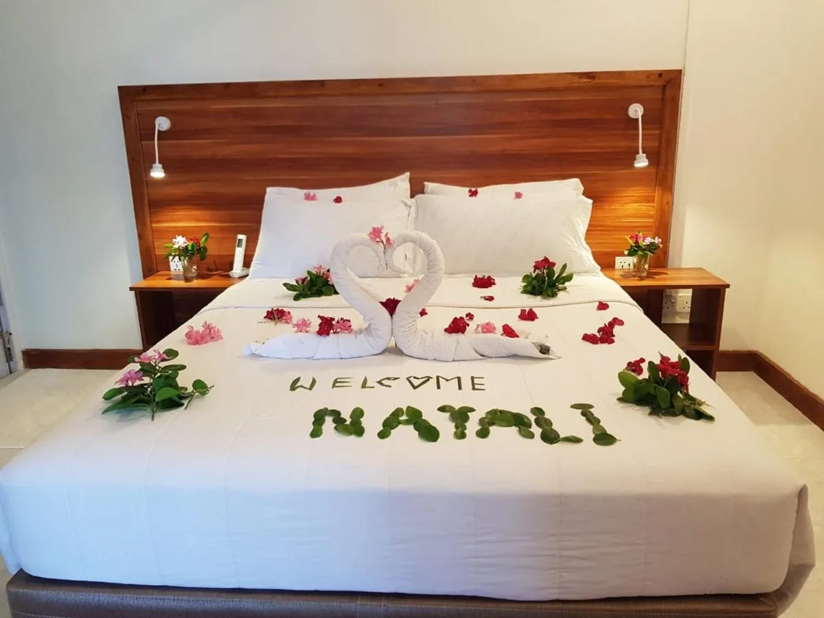 Immerse yourself in the surfer's paradise at Batuta Maldives. This laid-back beach front guest house offers comfortable rooms, a relaxed atmosphere, and easy access to renowned surf breaks.