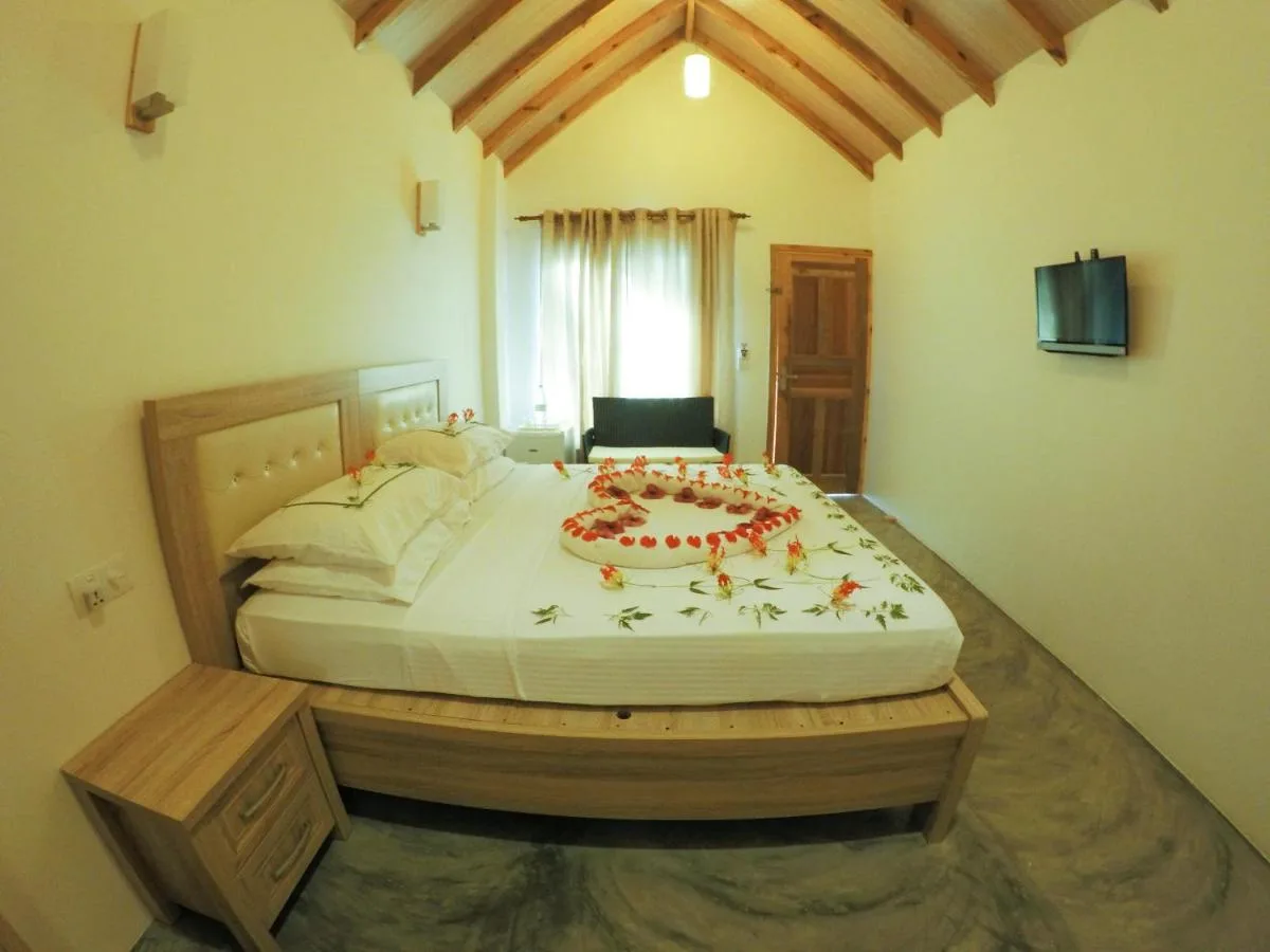 Experience beachfront bliss at Holiday Cottage. This highly-rated guest house boasts stylish bungalows with balconies offering breathtaking ocean views.