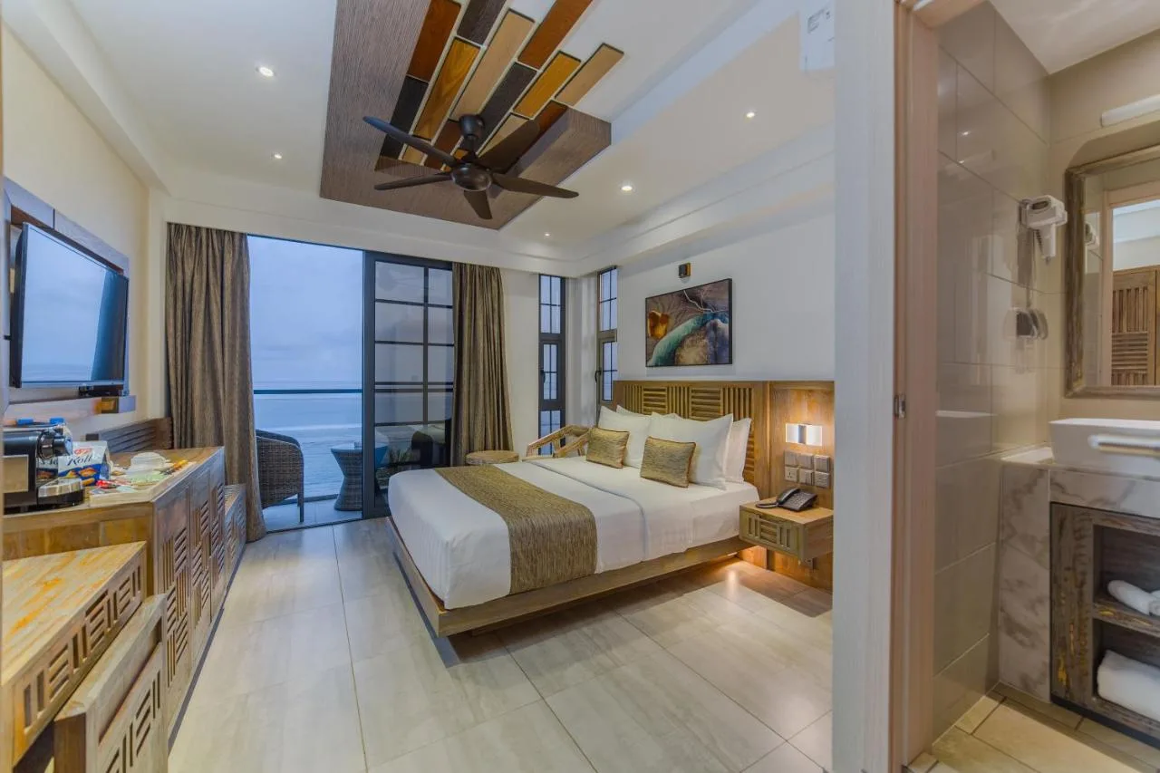 Hotel Ocean Grand at Hulhumale' is a modern hotel with beachfront location, rooftop terrace, and a restaurant serving international cuisine.