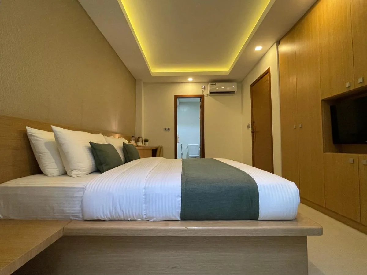 Immerse yourself in island life at Huvan Beach Hotel Hulhumalé. This hotel offers comfortable rooms, a rooftop restaurant with stunning ocean views, and a swimming pool.