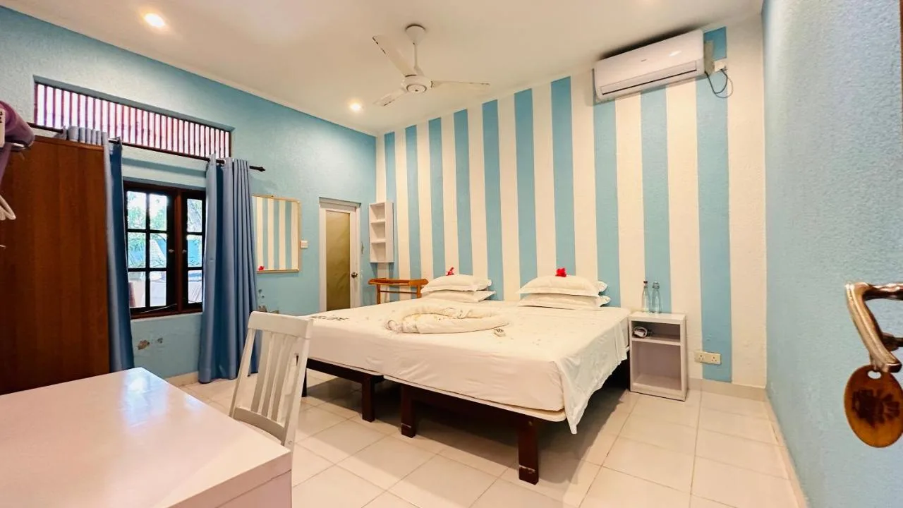 Situated in Thulusdhoo, 100 metres from Bikini Beach, Midsummer Thulusdhoo features air-conditioned rooms with free WiFi and express check-in and check-out.