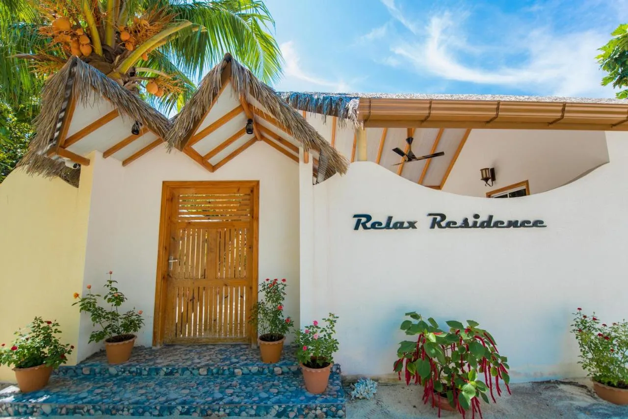 Embrace laid-back luxury at Relax Residence. This modern guest house offers stylish rooms and an infinity pool with stunning ocean views.