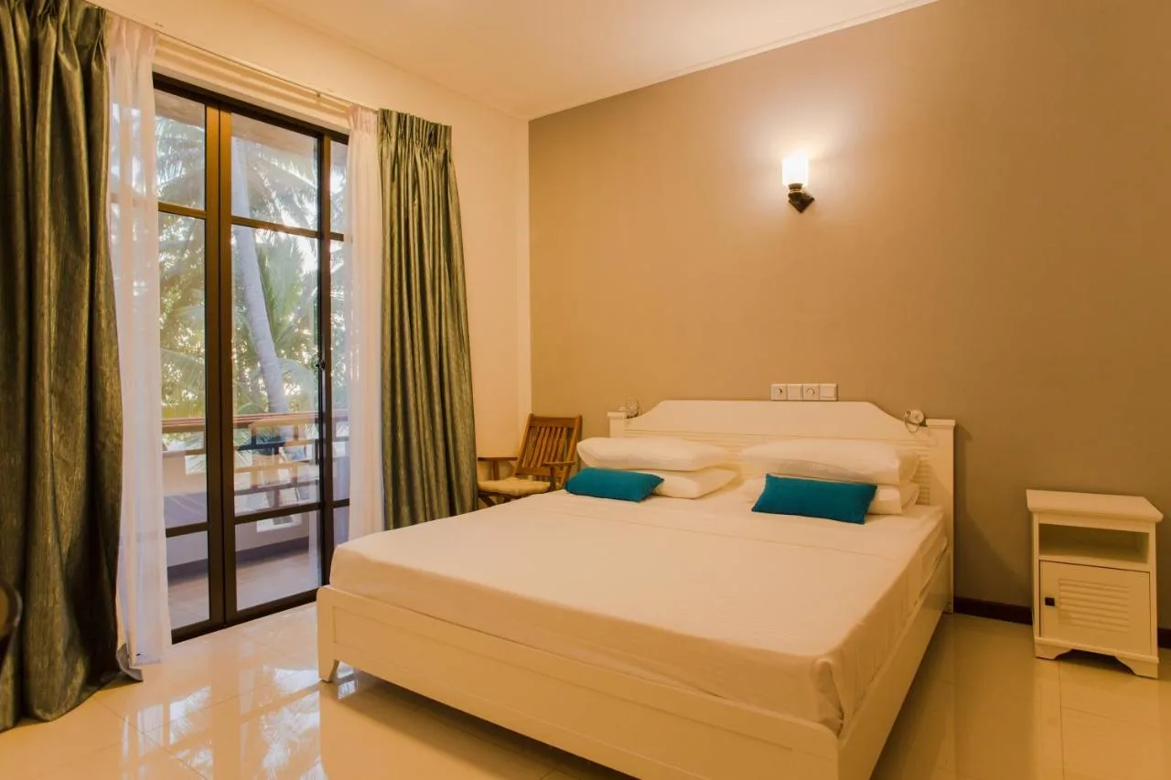 Discover a blend of comfort and affordability at Riveli Retreat Mathiveri. This laid-back guest house offers clean rooms and a relaxed atmosphere.