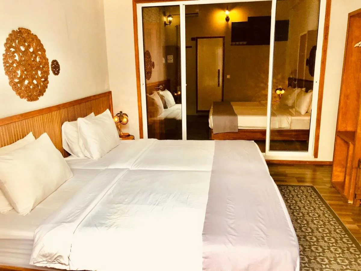 Immerse yourself in island life at Sandy Heaven Maldives. This cottage-style accommodation offers a relaxed atmosphere and comfortable rooms.