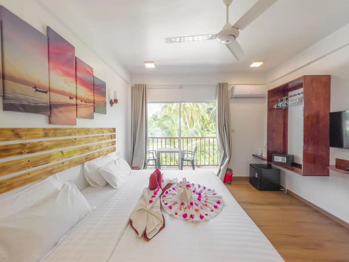 Immerse yourself in island life at Summer Inn. This family-run guest house offers comfortable rooms, a warm atmosphere, and delicious local cuisine prepared with fresh ingredients.