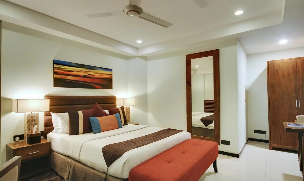 Experience modern comfort at The Somerset Hotel. This hotel boasts spacious rooms, a rooftop restaurant with stunning city views, and a swimming pool.